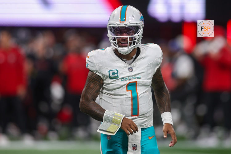 Oct 26, 2025; Atlanta, Georgia, USA; Miami Dolphins quarterback Tua Tagovailoa (1) in action against the Atlanta Falcons in the fourth quarter at Mercedes-Benz Stadium. Credit: Brett Davis-Imagn Images