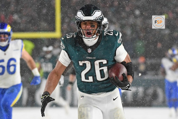 Jan 19, 2025; Philadelphia, Pennsylvania, USA; Philadelphia Eagles running back Saquon Barkley (26) runs for on a 78-yard touchdown run against the Los Angeles Rams during the fourth quarter in a 2025 NFC divisional round game at Lincoln Financial Field. Credit: Eric Hartline-Imagn Images