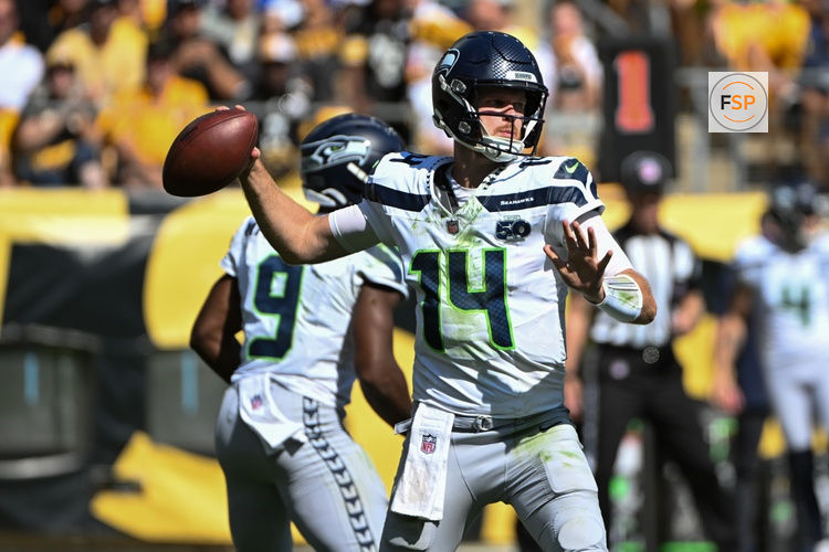 Sep 14, 2025; Pittsburgh, Pennsylvania, USA; Seattle Seahawks quarterback Sam Darnold (14) throws a pass against the Pittsburgh Steelers during the second half at Acrisure Stadium. Credit: Barry Reeger-Imagn Images