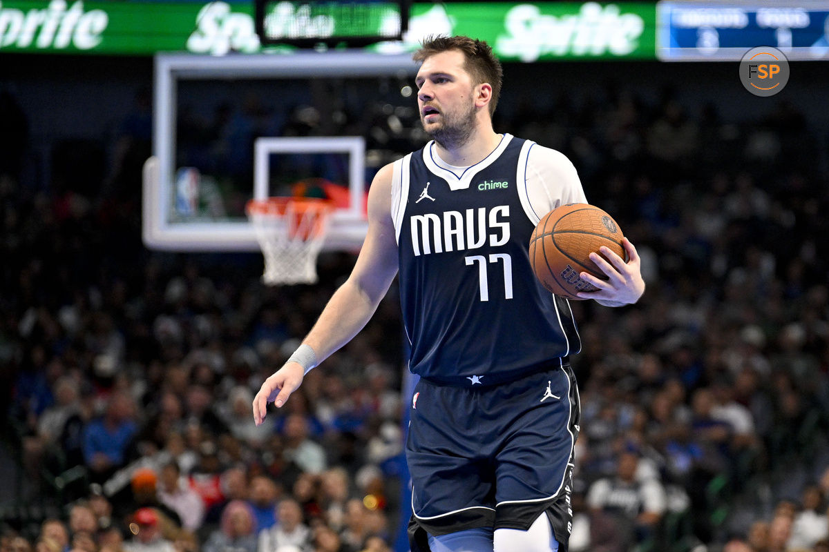 Nov 19, 2024; Dallas, Texas, USA; Dallas Mavericks guard Luka Doncic (77) brings the ball up court against the New Orleans Pelicans during the second half at the American Airlines Center. Credit: Jerome Miron-Imagn Images