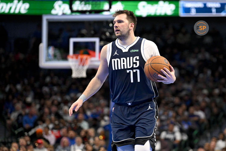 Nov 19, 2024; Dallas, Texas, USA; Dallas Mavericks guard Luka Doncic (77) brings the ball up court against the New Orleans Pelicans during the second half at the American Airlines Center. Credit: Jerome Miron-Imagn Images