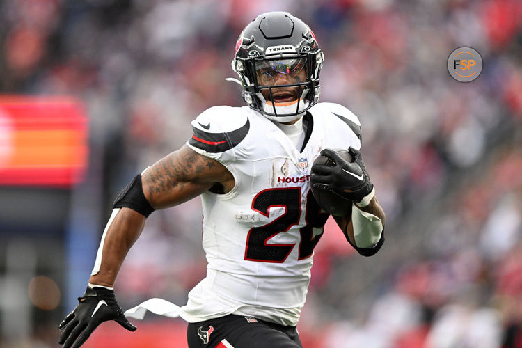 Oct 13, 2024; Foxborough, Massachusetts, USA; Houston Texans running back Joe Mixon (28) runs for a touchdown against the New England Patriots during the second half at Gillette Stadium. Credit: Brian Fluharty-Imagn Images