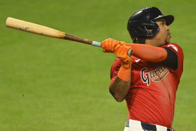 Sep 25, 2024; Cleveland, Ohio, USA; Cleveland Guardians third baseman Jose Ramirez (11) hits a three-run home run in the eighth inning against the Cincinnati Reds at Progressive Field. Mandatory Credit: David Richard-Imagn Images