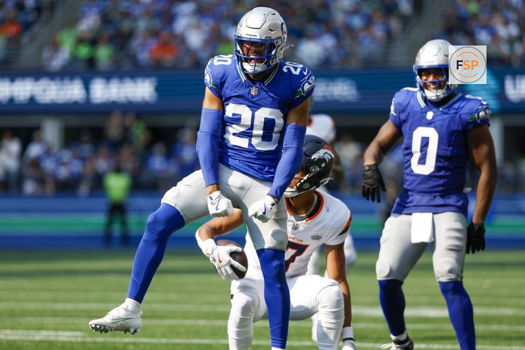 Sep 8, 2024; Seattle, Washington, USA; Seattle Seahawks safety Julian Love (20) celebrates after making a tackle against the Denver Broncos during the third quarter at Lumen Field. Credit: Joe Nicholson-Imagn Images