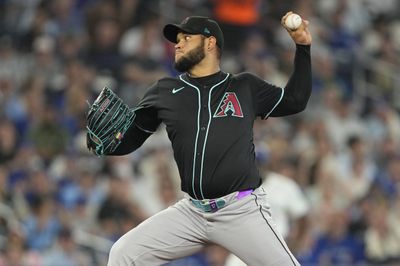 Jun 18, 2025; Toronto, Ontario, CAN; Arizona Diamondbacks starting pitcher Eduardo Rodriguez (57) pitches to the Toronto Blue Jays during the fourth inning at Rogers Centre. Mandatory Credit: John E. Sokolowski-Imagn Images