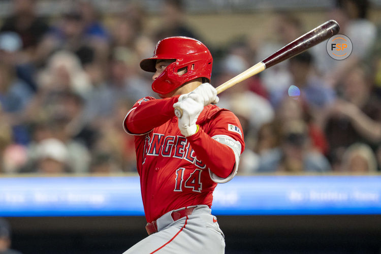 Sep 9, 2024; Minneapolis, Minnesota, USA; Los Angeles Angels catcher Logan O'Hoppe (14) hits a single against the Minnesota Twins in the sixth inning at Target Field. Credit: Jesse Johnson-Imagn Images