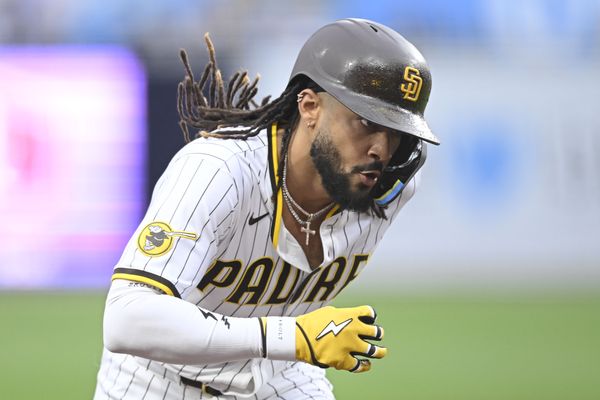 May 27, 2025; San Diego, California, USA; San Diego Padres outfielder Fernando Tatis Jr. (23) rounds the bases after hitting a solo home run during the first inning against the Miami Marlins at Petco Park. Mandatory Credit: Denis Poroy-Imagn Images