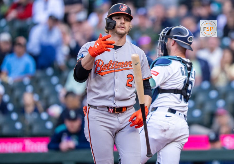Jun 4, 2025; Seattle, Washington, USA; Balitimore Orioles shortstop Gunnar Henderson (2) tosses hit bat after striking out during the first inning against the Seattle Mariners at T-Mobile Park. Credit: Stephen Brashear-Imagn Images
