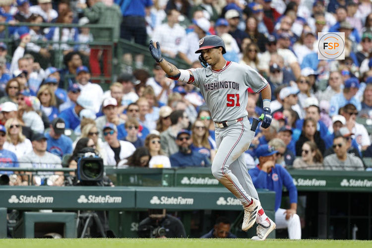 Sep 6, 2025; Chicago, Illinois, USA; Washington Nationals left fielder Daylen Lile (51) rounds the bases after hitting a solo home run against the Chicago Cubs during the fourth inning at Wrigley Field. Credit: Kamil Krzaczynski-Imagn Images