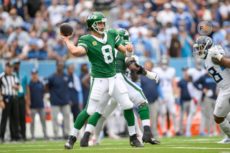 Sep 15, 2024; Nashville, Tennessee, USA;  New York Jets quarterback Aaron Rodgers (8) passes the ball against the Tennessee Titans during the second half at Nissan Stadium. Credit: Steve Roberts-Imagn Images