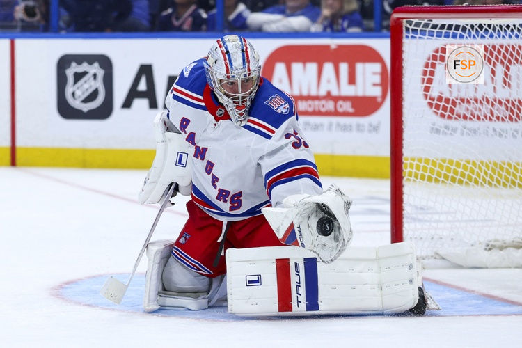 Apr 15, 2026; Tampa, Florida, USA; New York Rangers goaltender Dylan Garand (33) makes a save against the Tampa Bay Lightning in the third period at Benchmark International Arena. Credit: Nathan Ray Seebeck-Imagn Images