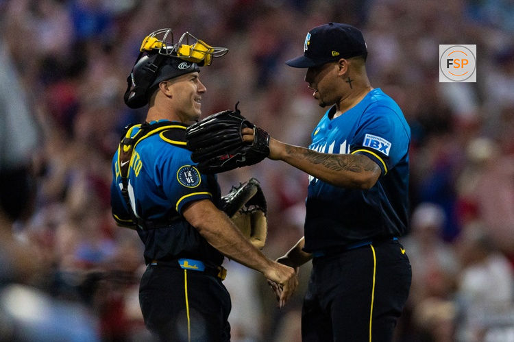 Aug 1, 2025; Philadelphia, Pennsylvania, USA; Philadelphia Phillies pitcher Jhoan Duran (59) celebrates with catcher J.T. Realmuto (10) after a victory against the Detroit Tigers at Citizens Bank Park. Credit: Bill Streicher-Imagn Images