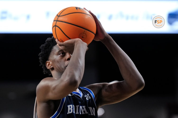 Mar 3, 2026; Cincinnati, Ohio, USA;  BYU Cougars forward AJ Dybantsa (3) attempts a free throw against the Cincinnati Bearcats in the second half at Fifth Third Arena. Credit: Aaron Doster-Imagn Images