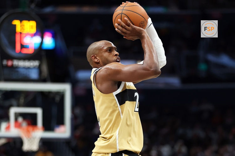 Jan 29, 2026; Washington, District of Columbia, USA; Washington Wizards forward Khris Middleton (22) takes a shot during the second half against the Milwaukee Bucks at Capital One Arena. Credit: Daniel Kucin Jr.-Imagn Images