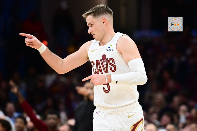 Jan 10, 2026; Cleveland, Ohio, USA; Cleveland Cavaliers guard Sam Merrill (5) celebrates after hitting a three point basket against the Minnesota Timberwolves during the second half at Rocket Arena. Credit: Ken Blaze-Imagn Images