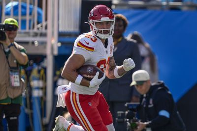 Nov 24, 2024; Charlotte, North Carolina, USA;  Kansas City Chiefs tight end Noah Gray (83) scores the opening touchdown pass against the Carolina Panthers during the first quarter at Bank of America Stadium. Mandatory Credit: Jim Dedmon-Imagn Images