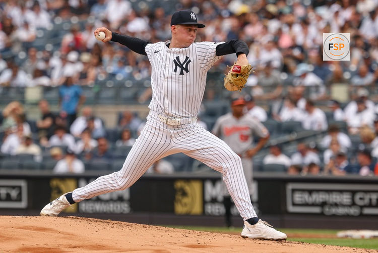 Jun 22, 2025; Bronx, New York, USA; New York Yankees starting pitcher Will Warren (98) delivers a pitch during the second inning against the Baltimore Orioles  at Yankee Stadium. Credit: Vincent Carchietta-Imagn Images