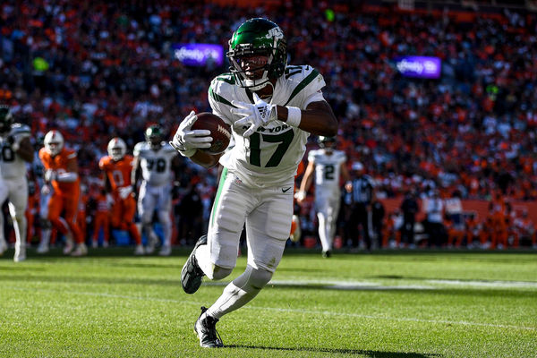 DENVER, CO - OCTOBER 8: New York Jets wide receiver Garrett Wilson (17) attempts to run after a catch in the third quarter during a game between the New York Jets and the Denver Broncos at Empower Field at Mile High on October 8, 2023 in Denver, Colorado. (Photo by Dustin Bradford/Icon Sportswire)