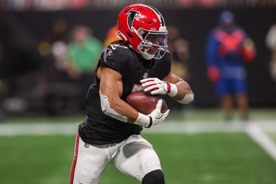 Dec 29, 2025; Atlanta, Georgia, USA; Atlanta Falcons running back Bijan Robinson (7) runs the ball for a touchdown against the Los Angeles Rams in the second quarter at Mercedes-Benz Stadium. Mandatory Credit: Brett Davis-Imagn Images
