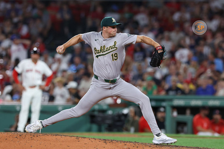 Jul 10, 2024; Boston, Massachusetts, USA; Oakland Athletics relief pitcher Mason Miller (19) delivers a pitch during the ninth inning against the Boston Red Sox at Fenway Park. Credit: Paul Rutherford-USA TODAY Sports