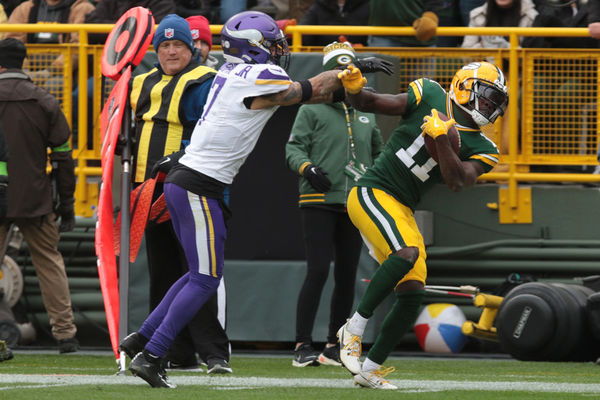 GREEN BAY, WI - OCTOBER 29: Green Bay Packers wide receiver Jayden Reed (11) is pushed out of bounds during a game between the Green Bay Packers and the Minnesota Vikings on October 29, 2023 at Lambeau Field, in Green Bay, WI. (Photo by Larry Radloff/Icon Sportswire)