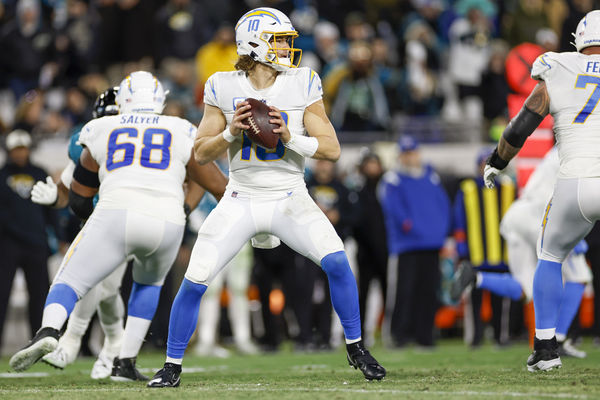 JACKSONVILLE, FL - JANUARY 14: Los Angeles Chargers quarterback Justin Herbert (10) throws a pass during the game between the Los Angeles Chargers and the Jacksonville Jaguars on January 14, 2023 at TIAA Bank Field in Jacksonville, Fl. (Photo by David Rosenblum/Icon Sportswire)