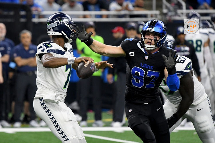 Sep 30, 2024; Detroit, Michigan, USA; Detroit Lions defensive end Aidan Hutchinson (97) rushes towards Seattle Seahawks quarterback Geno Smith (7) in the third quarter at Ford Field. Credit: Eamon Horwedel-Imagn Images