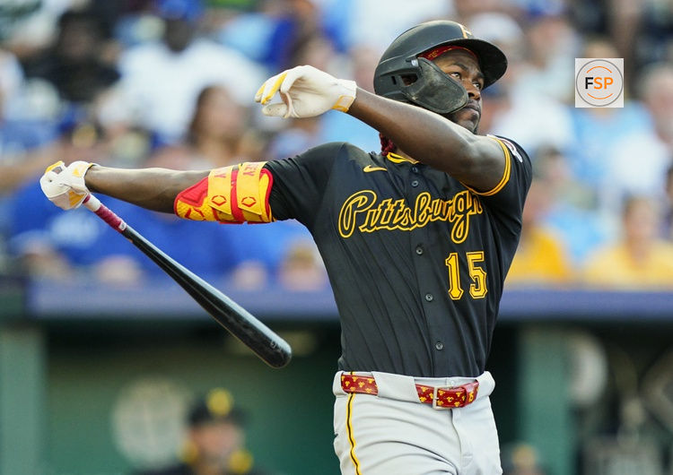 Jul 8, 2025; Kansas City, Missouri, USA; Pittsburgh Pirates center fielder Oneil Cruz (15) hits a home run during the fifth inning against the Kansas City Royals at Kauffman Stadium. Credit: Jay Biggerstaff-Imagn Images