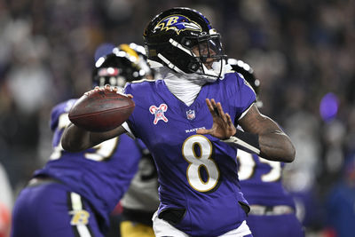 Dec 21, 2024; Baltimore, Maryland, USA;  Baltimore Ravens quarterback Lamar Jackson (8) throws from the pocket during the first half against the Pittsburgh Steelers at M&T Bank Stadium. Mandatory Credit: Tommy Gilligan-Imagn Images