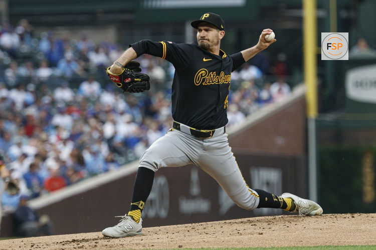 Jun 12, 2025; Chicago, Illinois, USA; Pittsburgh Pirates starting pitcher Andrew Heaney (45) delivers a pitch against the Chicago Cubs during the first inning at Wrigley Field. Credit: Kamil Krzaczynski-Imagn Images