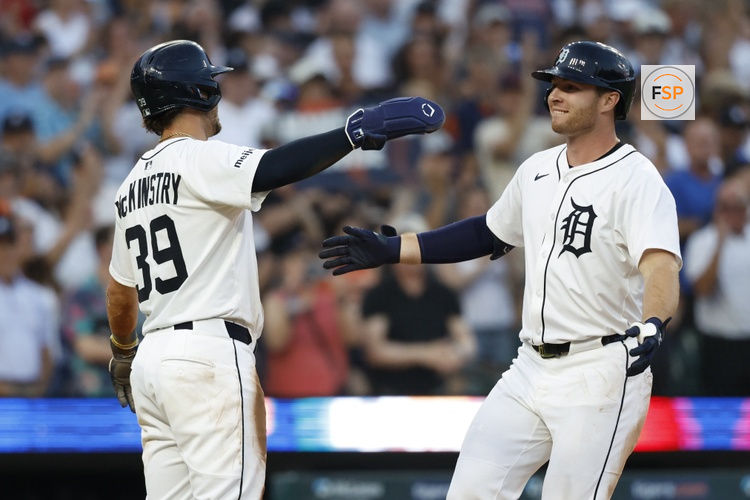 Jul 8, 2025; Detroit, Michigan, USA;  Detroit Tigers designated hitter Colt Keith (33) receives congratulations from third baseman Zach McKinstry (39) after he hits a two run home run in the seventh inning against the Tampa Bay Rays at Comerica Park. Credit: Rick Osentoski-Imagn Images
