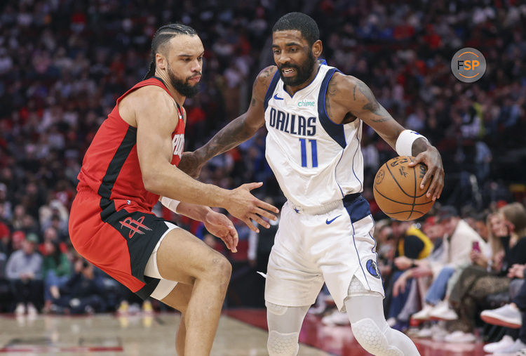 Jan 1, 2025; Houston, Texas, USA; Dallas Mavericks guard Kyrie Irving (11) controls the ball as Houston Rockets forward Dillon Brooks (9) defends during the third quarter at Toyota Center. Credit: Troy Taormina-Imagn Images