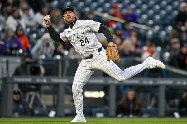 DENVER, CO - MAY 07: Colorado Rockies third baseman Ryan McMahon (24) throws to first base after fielding a soft ground ball during a game between the San Francisco Giants and the Colorado Rockies at Coors Field on May 7, 2024 in Denver, Colorado. (Photo by Dustin Bradford/Icon Sportswire)