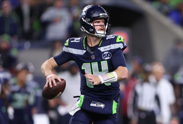 Oct 20, 2025; Seattle, Washington, USA; Seattle Seahawks quarterback Sam Darnold (14) looks to throw a pass during the second quarter against the Houston Texans at Lumen Field. Mandatory Credit: Kevin Ng-Imagn Images
