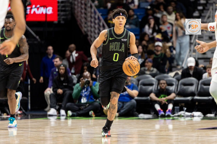 Dec 29, 2025; New Orleans, Louisiana, USA;  New Orleans Pelicans guard Jeremiah Fears (0) brings the ball up court against the New York Knicks during the second half at Smoothie King Center. Credit: Stephen Lew-Imagn Images