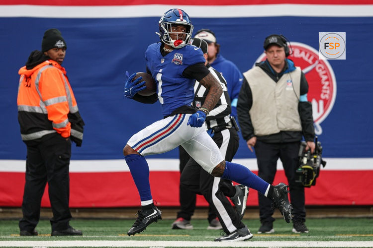 Dec 29, 2024; East Rutherford, New Jersey, USA; New York Giants wide receiver Malik Nabers (1) scores on a touchdown reception during the second half against the Indianapolis Colts at MetLife Stadium. Credit: Vincent Carchietta-Imagn Images