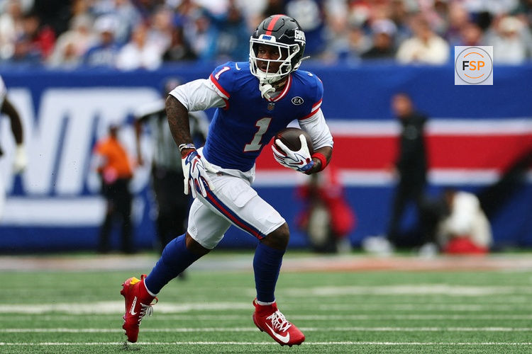 Oct 4, 2026; East Rutherford, New Jersey, USA;  New York Giants wide receiver Malik Nabers (1) runs the ball during the third quarter at MetLife Stadium.  Credit: Vincent Carchietta-Imagn Images
