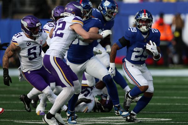 Dec 21, 2025; East Rutherford, New Jersey, USA; New York Giants running back Tyrone Tracy Jr. (29) rushes the ball against the Minnesota Vikings during the first half at MetLife Stadium. Mandatory Credit: Vincent Carchietta-Imagn Images
