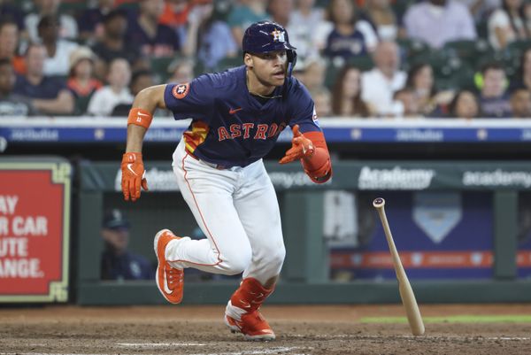 May 25, 2025; Houston, Texas, USA; Houston Astros right fielder Cam Smith (11) hits an RBI single during the sixth inning against the Seattle Mariners at Daikin Park. Mandatory Credit: Troy Taormina-Imagn Images