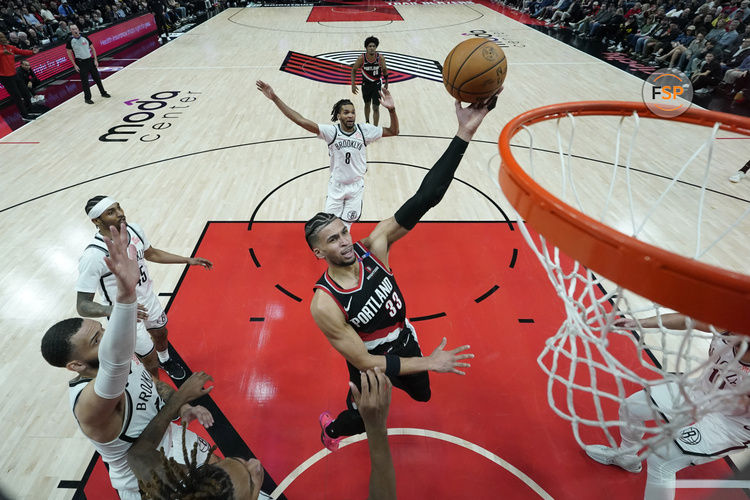 Jan 14, 2025; Portland, Oregon, USA; Portland Trail Blazers forward Toumani Camara (33) shoots the ball during the first half against the Brooklyn Nets at Moda Center. Credit: Soobum Im-Imagn Images