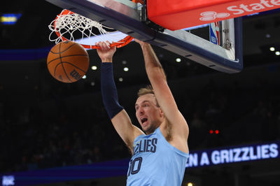 Jan 22, 2025; Memphis, Tennessee, USA; Memphis Grizzlies guard Luke Kennard (10) dunks during the fourth quarter against the Charlotte Hornets at FedExForum. Mandatory Credit: Petre Thomas-Imagn Images