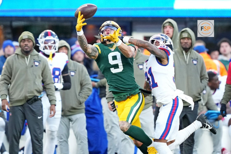 Nov 16, 2025; East Rutherford, New Jersey, USA; Green Bay Packers wide receiver Christian Watson (9) reaches for the ball but can not make the catch against New York Giants cornerback Nic Jones (31) during the third quarter at MetLife Stadium. Credit: Robert Deutsch-Imagn Images