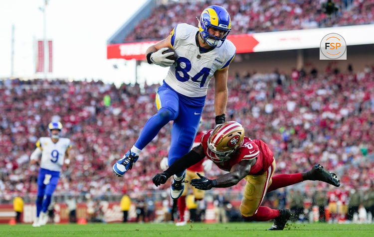 Nov 9, 2025; Santa Clara, California, USA; Los Angeles Rams tight end Colby Parkinson (84) runs after a catch against San Francisco 49ers safety Malik Mustapha (6) during the fourth quarter at Levi's Stadium. Credit: Kyle Terada-Imagn Images