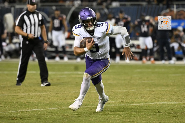 Sep 8, 2025; Chicago, Illinois, USA; Minnesota Vikings quarterback J.J. McCarthy (9) rushes the ball against the Chicago Bears during the second half at Soldier Field. Credit: Matt Marton-Imagn Images