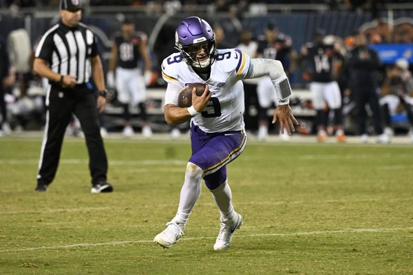Sep 8, 2025; Chicago, Illinois, USA; Minnesota Vikings quarterback J.J. McCarthy (9) rushes the ball against the Chicago Bears during the second half at Soldier Field. Mandatory Credit: Matt Marton-Imagn Images