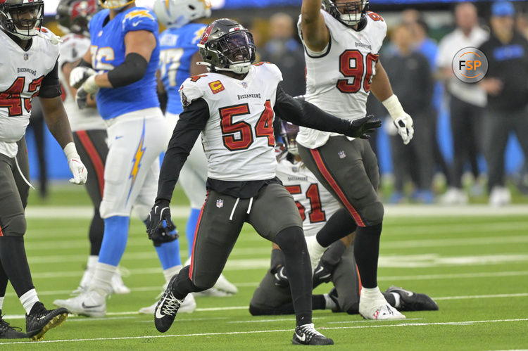 Dec 15, 2024; Inglewood, California, USA; Tampa Bay Buccaneers linebacker Lavonte David (54) celebrates after a sack of Los Angeles Chargers quarterback Justin Herbert (10) in the second half at SoFi Stadium. Credit: Jayne Kamin-Oncea-Imagn Images