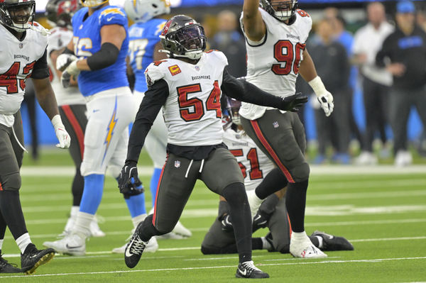 Dec 15, 2024; Inglewood, California, USA; Tampa Bay Buccaneers linebacker Lavonte David (54) celebrates after a sack of Los Angeles Chargers quarterback Justin Herbert (10) in the second half at SoFi Stadium. Mandatory Credit: Jayne Kamin-Oncea-Imagn Images