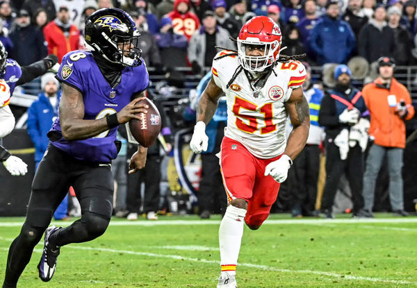 BALTIMORE, MD - JANUARY 28:  Baltimore Ravens quarterback Lamar Jackson (8) in action against Kansas City Chiefs defensive end Mike Danna (51) during the Kansas City Chiefs game versus the Baltimore Ravens in the AFC Championship Game on January 28, 2024 at M&T Bank Stadium in Baltimore, MD.  (Photo by Mark Goldman/Icon Sportswire)