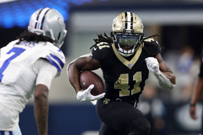 Sep 15, 2024; Arlington, Texas, USA; New Orleans Saints running back Alvin Kamara (41) runs against the Dallas Cowboys in the second half at AT&T Stadium. Mandatory Credit: Tim Heitman-Imagn Images