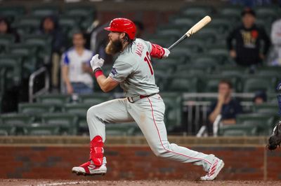 Apr 25, 2026; Atlanta, Georgia, USA; Philadelphia Phillies left fielder Brandon Marsh (16) hits an two-run single against the Atlanta Braves in the tenth inning at Truist Park. Mandatory Credit: Brett Davis-Imagn Images